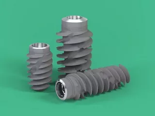 Three Straumann BLX implants with wide, deep threads.